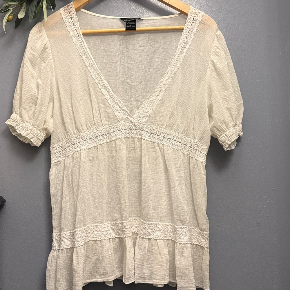 Moda International women’s Cream Lace V-Neck Top